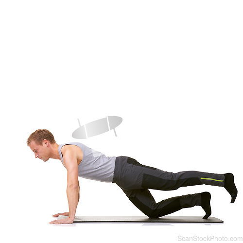 Image of Man, pilates and mat in studio for stretching legs, fitness or workout for healthy body, wellness or core muscle. Person, exercise or yoga on floor for abdomen on mockup space or white background