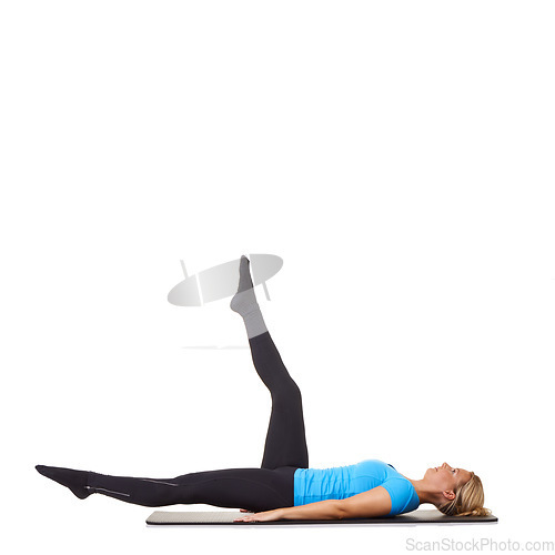 Image of Woman, yoga and mat in studio for stretching legs, fitness or workout for healthy body, wellness or core muscle. Person, exercise or pilates on floor for abdomen on mockup space or white background