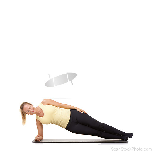 Image of Woman, yoga and mat in studio with side plank, fitness or workout for healthy body, happy or core muscle. Person, portrait and pilates on floor for abdomen health on mockup space or white background