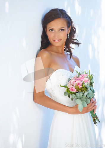 Image of Event, wedding and bouquet with portrait of woman at venue for love, celebration and engagement. Ceremony, reception and fashion with bride and flowers in dress for happy, commitment and marriage