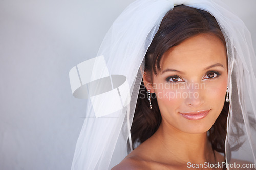 Image of Bride, portrait and glow beauty for wedding with fashion, cosmetic and jewellery for nuptial ceremony. Woman, face and make up for holy matrimony or engagement, commitment and happy with white veil