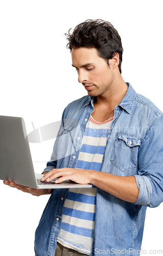 Image of Man, laptop and typing an email, studio and networking with internet connection by white background. Male person, technology and website for planning, online research and copywriting or freelancer