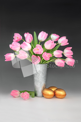 Image of Happy Easter with Luxury Gold Eggs and Pink Tulips