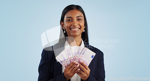 Image of Business woman, portrait and money fan in financial freedom against a blue studio background. Happy face of female person or employee with cash, savings or investment for bonus salary on mockup space