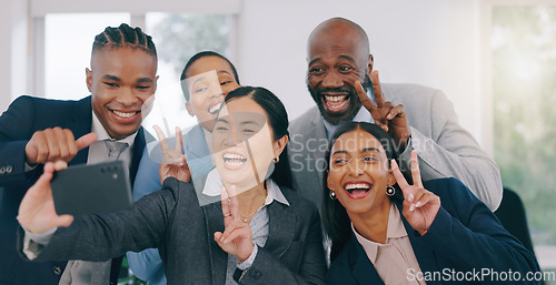 Image of Goofy, selfie and happy business people in office for team building or bonding together. Silly, diversity and group of professional work friends taking a picture with funny face at modern workplace.