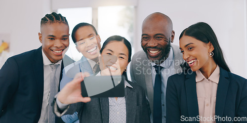 Image of Smile, selfie and happy business people in the office for team building or bonding together. Collaboration, diversity and group of professional work friends taking a picture at modern workplace.