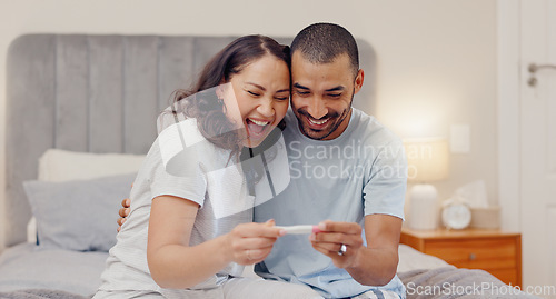 Image of Excited couple, bed and positive pregnancy test for maternity, responsibility or family at home. Happy man and pregnant woman smile for parenthood, morning or good news or results in bedroom at house