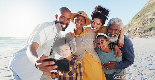 Image of Love, selfie and happy family at a beach for travel, fun or adventure in nature together. Ocean, profile picture and African kids with parents and grandparents at the sea for summer, vacation or trip