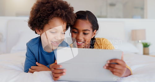 Image of Happy children, tablet and bed for streaming entertainment, morning or holiday weekend together at home. Little boy, girl or siblings smile on technology for watching, games or online series at house
