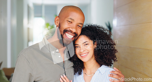 Image of African couple, smile and hug at front door in portrait with pride, care and bonding at new home. Man, woman and happy together with embrace, love and investment with property, real estate or house