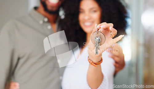 Image of Couple, hand and keys at front door, new home and portrait with pride, care and bonding. African woman, man and happy together with embrace, love and investment with property, real estate or house