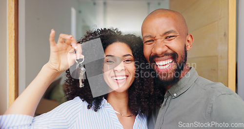 Image of Couple, portrait and keys at front door, new home and excited with pride, care and bonding. African woman, man and happy together with embrace, love and investment with property, real estate or house