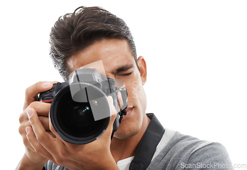 Image of Photography, man or face with digital camera in studio for photoshoot, creative production or content creation on white background. Journalist, cameraman or photographer click lens for multimedia art