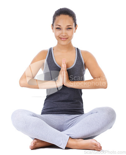 Image of Woman, yoga and praying hands in studio fitness, meditation and holistic workout or mental health wellness. Portrait of a young person with calm, peace and zen exercise or faith on a white background