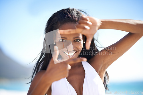 Image of Selfie frame, hands and black woman at a beach for portrait photography, memory or gesture in nature. Finger, border and face of African travel influencer with sign for screenshot or profile picture