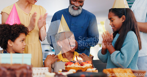 Image of Cake, happy and family at birthday party celebration together at modern house with candles. Smile, excited and young children with African father and grandparents with hat for sweet dessert at home.