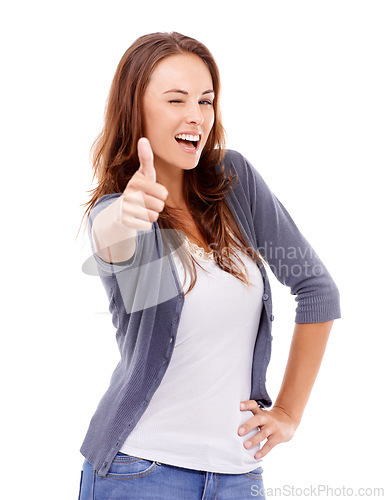 Image of Thumbs up, portrait and woman wink in studio for winning achievement, celebrate deal and vote on white background. Happy model, emoji sign and yes for feedback, promotion and thank you for excellence