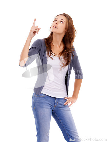 Image of Pointing, looking and young woman in a studio with mockup for marketing, promotion or advertising. View, mock up and female person from Canada with show hand gesture isolated by white background.