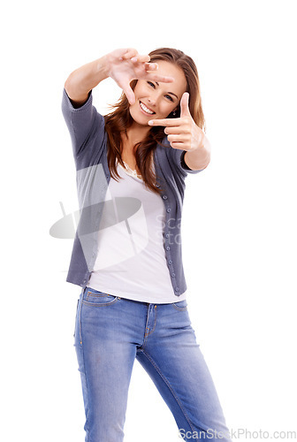 Image of Portrait, happy woman and finger frame in studio to review profile picture, check creative composition and border on white background. Model planning perspective for photography of perfect selfie