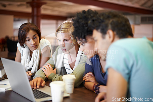 Image of Teamwork, laptop or students studying in school, university library or college campus for education. Diversity, elearning or group of people with scholarship, reading news, research or online course