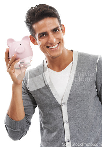 Image of Portrait, man and piggy bank in studio for investment, finance or investing income on white background. Happy model, financial savings or moneybox for growth, cash funding or economy of future wealth