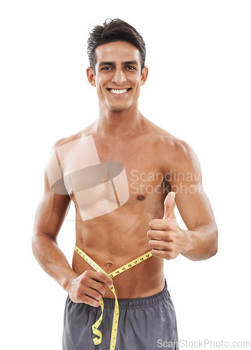 Image of Happy man, portrait and thumbs up with tape measure for fitness, success or diet against a white studio background. Handsome and muscular male person with like emoji or yes sign for workout exercise