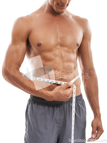 Image of Muscular man, waist and tape measure for weight loss, diet or exercise against a white studio background. Closeup of male person hands measuring body, size or length for health and wellness on mockup