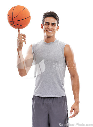 Image of Happy man, portrait and basketball on finger for game, match or sport against a white studio background. Active male person or athlete smile with ball ready in fitness, skill or style on mockup space