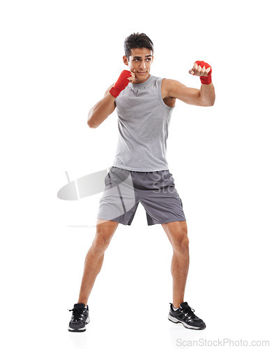 Image of Boxer, man and kickboxing in studio with sports for fitness, health and martial arts isolated on white background. Strong athlete with muscle, action and fighting with MMA training and exercise