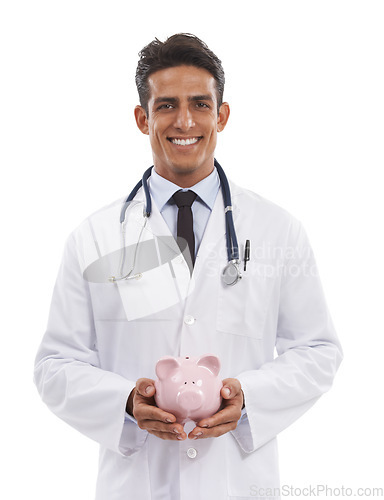 Image of Doctor, man and piggy bank for savings in portrait, investment and financial loan for healthcare. Male professional, funding and planning hospital budget by white background, studio and security