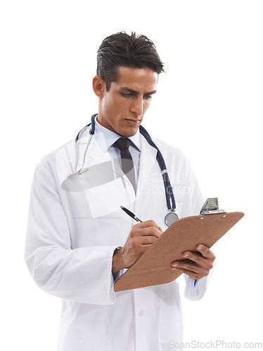 Image of Man, doctor and writing on clipboard in studio, planning notes and healthcare information on white background. Serious medical worker with report of insurance checklist, paperwork and medicine script