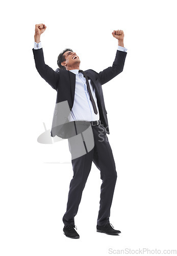 Image of Business man, fist celebration and studio with smile for profit, revenue and bonus by white background. Entrepreneur, trader or winner person with goals, achievement and happy with yes for results