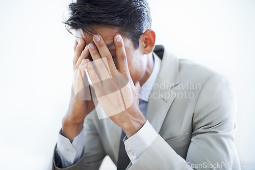 Image of Man, face in hands and business fail with stress about mistake in corporate project. Anxiety, bankruptcy or debt in company with frustrated and tired worker, burnout in sales with crisis and fear