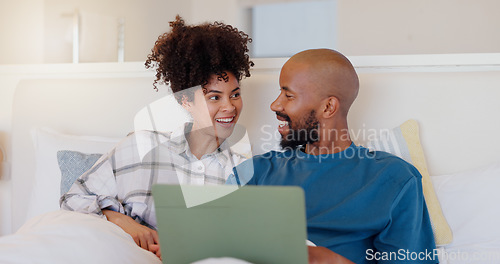 Image of Home, bed and black couple with a laptop, love or smile with website for comedy, internet or streaming a movie. Bedroom, apartment or man with woman, connection or film with romance, happy or bonding