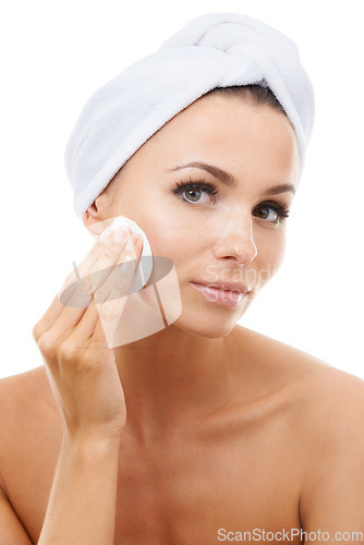 Image of Skincare, portrait or woman in studio with cotton pad on face, cosmetics or makeup cleaning product. Dermatology, remove or wellness for model with beauty, toner or facial glow on white background