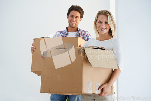 Image of Happy, boxes and portrait of couple in new home living room for unpacking and moving together. Smile, love and young man and woman from Australia with cardboard packages in home or apartment.