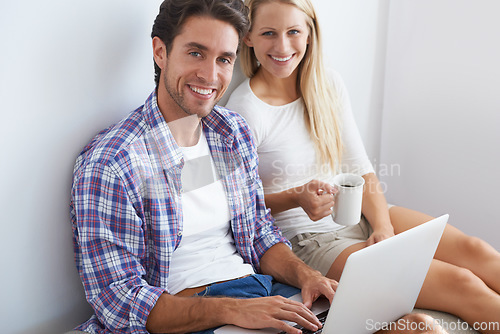 Image of Portrait, relax or happy couple on laptop for email, social media or streaming subscription in home. Coffee, booking holiday vacation online or people on website or internet to search with smile