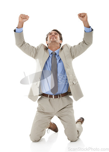 Image of Business man, hands up in celebration and kneeling on ground for winning at company on white background. Happiness, achievement and fist pump with corporate person on his knees in studio for success