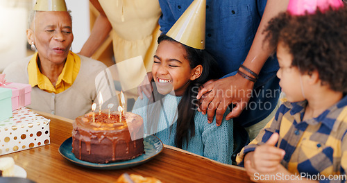 Image of Happy family, birthday and cake in celebration for party, holiday or special day together at home. Excited little girl or child smile in growth, love or care for event, bonding and wish with candles