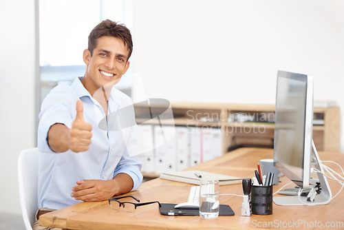 Image of Happy businessman, portrait and thumbs up at office for career success, winning or good job. Man or employee smile with like emoji, yes sign or OK for thank you or approval by computer at workplace