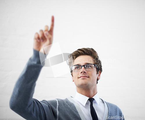 Image of Technician, man and pointing with hand, worker and professional in corporate clothes, fashion or fingers. Working, young and person with gesture, career or geek with glasses, nerd or businessman