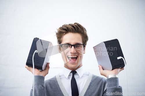 Image of Man, happy and hard drives for storage space, geek and cables for computer, face and young. Technician, excited and laughing with corporate clothes, fashionable and glasses for technology computing