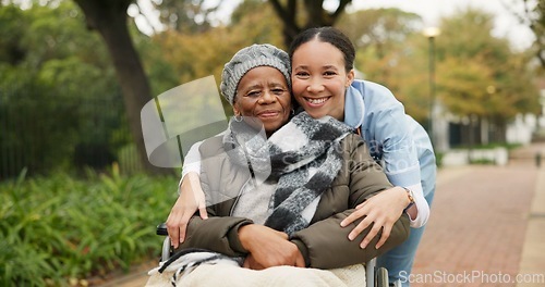 Image of Nurse, hug and park with old woman in a wheelchair for retirement, elderly care and physical therapy. Trust, medical and healthcare with portrait of patient and caregiver in nature for rehabilitation