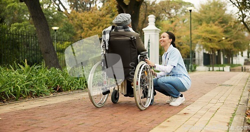 Image of Nurse, relax and park with old woman in a wheelchair for retirement, elderly care and physical therapy. Trust, medical and healthcare with senior patient and caregiver in nature for rehabilitation