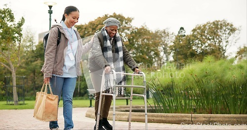 Image of Nurse, support and walker with old woman in park for helping, person with a disability and retirement. Elderly care, nursing and rehabilitation with caregiver and patient in nature for healthcare