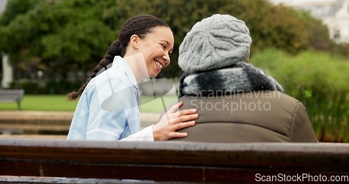 Image of Nurse, happy and support with old woman on park bench for retirement, elderly care and conversation. Trust, medical and healthcare with senior patient and caregiver in nature for rehabilitation