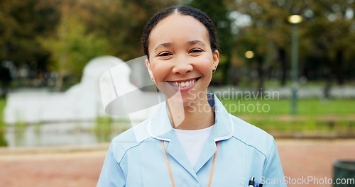 Image of Professional nurse woman, park and face with smile, young and excited for healthcare career in Toronto. Medic girl, outdoor and nature for walk, wellness and happy in summer sunshine in portrait