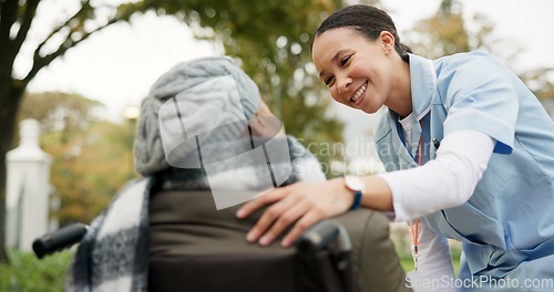 Image of Nurse, support and park with old woman in a wheelchair for retirement, elderly care and physical therapy. Trust, medical and healthcare with senior patient and caregiver in nature for rehabilitation