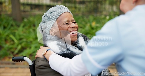 Image of Nurse, smile and park with old woman in a wheelchair for retirement, elderly care and physical therapy. Trust, medical and healthcare with african patient and caregiver in nature for rehabilitation
