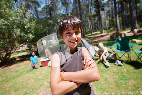 Image of Boy, kid and arms crossed in portrait summer camp and nature with fun outdoor for youth. Child at campsite in forest, adventure and vacation, childhood and recreation with happiness and smile